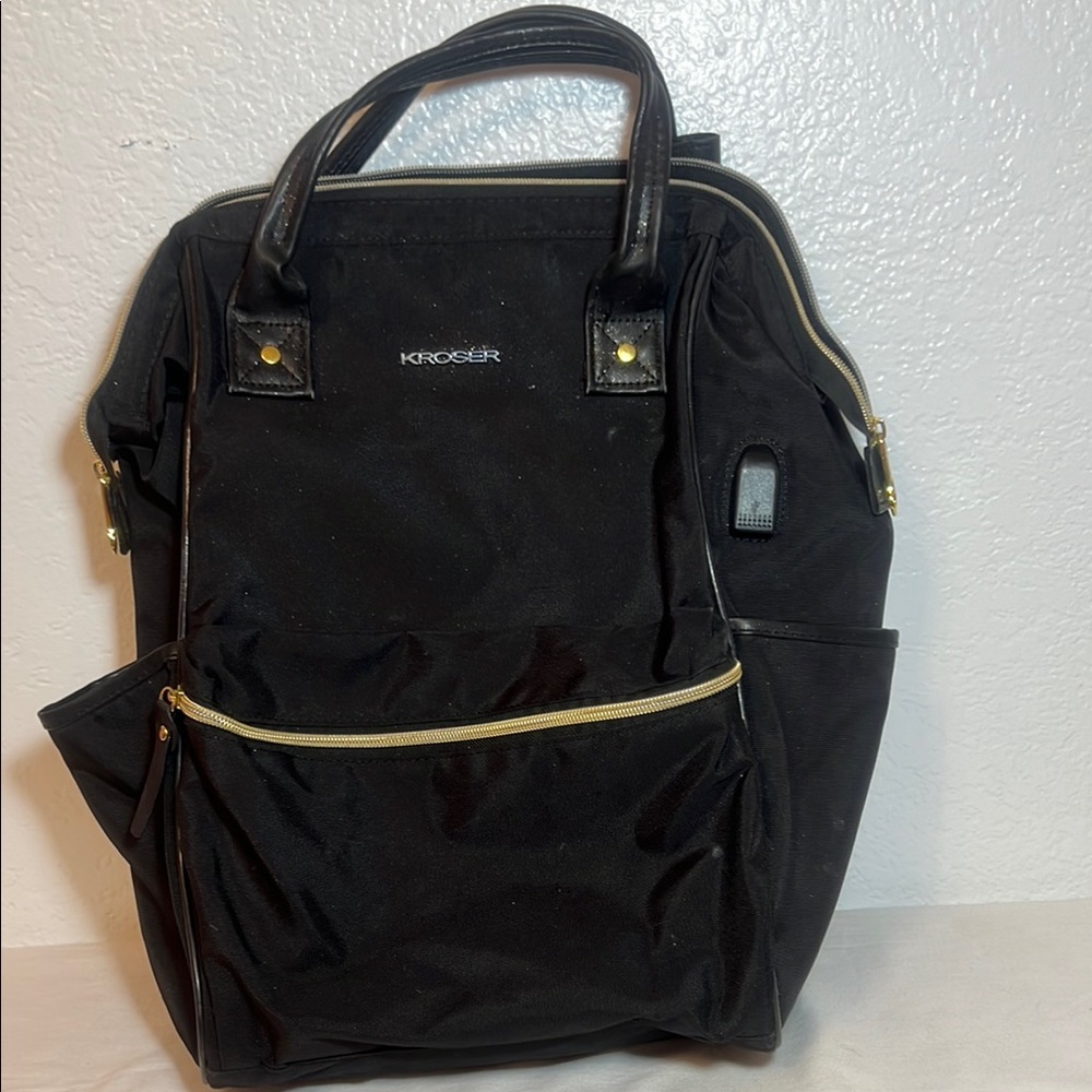 Black Backpack with Gold Accents